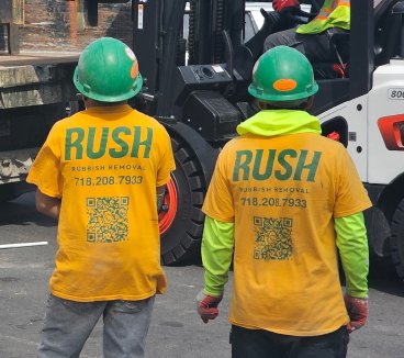 Rush crew member on site in a Rush shirt and hard hat